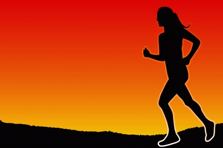 Woman jogging in the eveningの写真素材