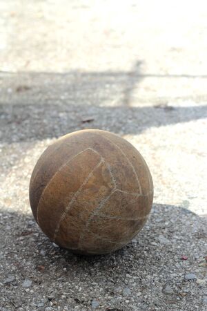 Old volleyball in outdoor courts の写真素材