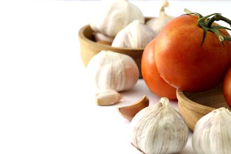 Tomatoes and garlicの写真素材