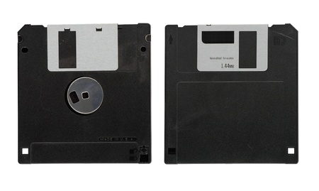Old diskette on white backgroundの写真素材