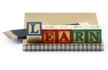 Alphabet learning blocks, notebook and pencilの写真素材