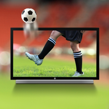 Live soccer on TVの写真素材