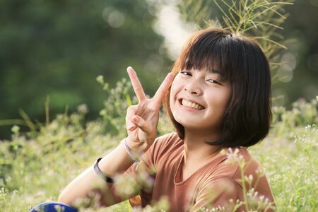 Young girl relaxing in the parkの写真素材