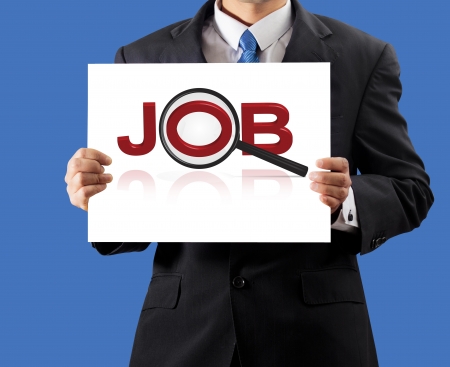Businessman holding search for jobの写真素材
