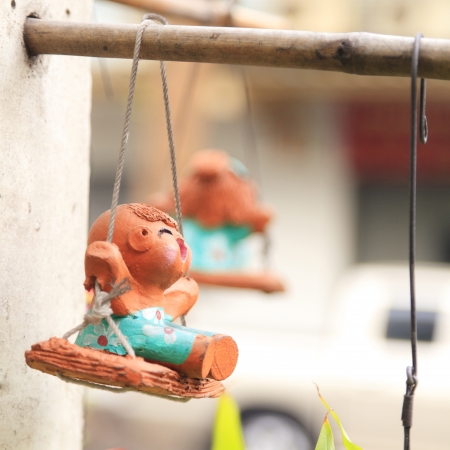 Clay dolls in the gardenの写真素材