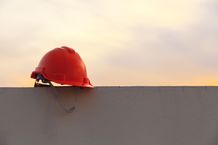 Construction helmet at sunsetの写真素材