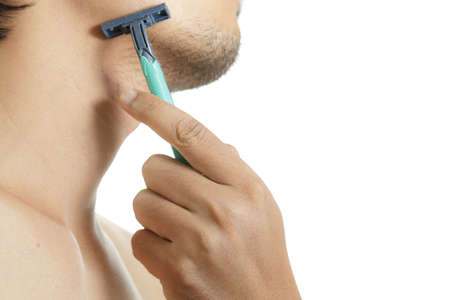 Close up of man shaving の写真素材