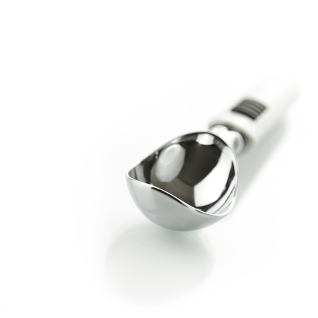 Spoon for ice cream on white background の写真素材