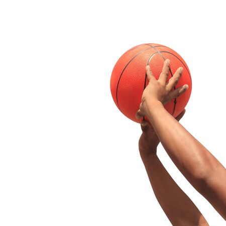 Hands and basketball on white background with clipping path の写真素材