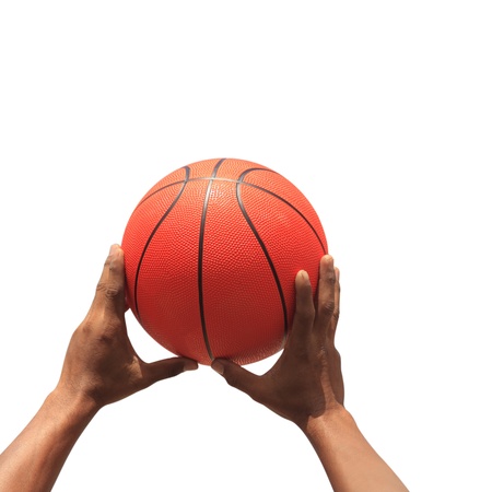 Hands and basketball on white backgroundの写真素材