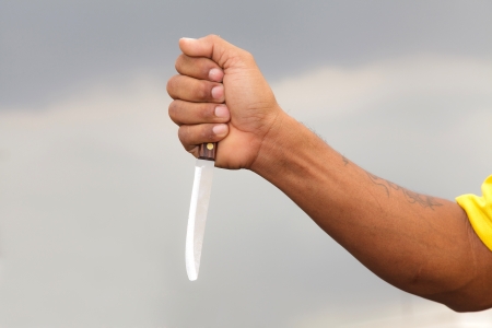 Knife in a handの写真素材
