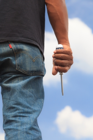 Man holding a screwdriverの写真素材