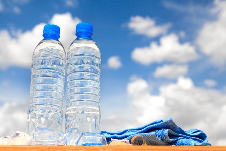 Water bottles with blue skyの写真素材