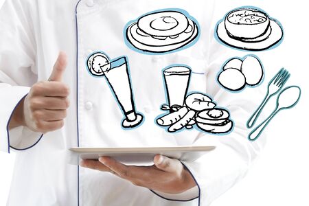 Chef using digital tablet with illustration kitchen accessories iconsの写真素材