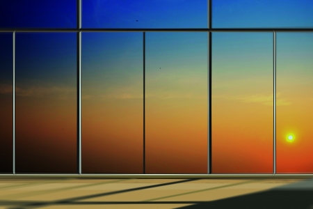 Windows in modern office building at sunrise