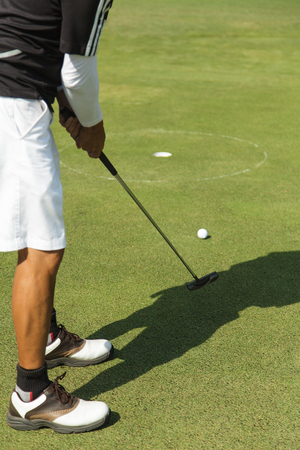 Man playing golf