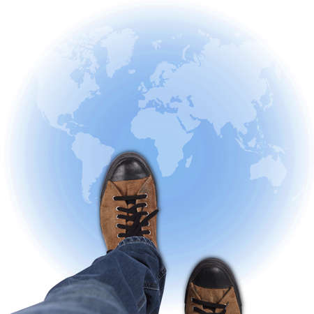 Pair of shoes standing on world map background