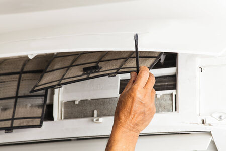 man repair air conditioner の写真素材