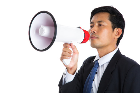 Male holding megaphone on white background の写真素材