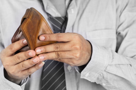 Hand and empty pocketの写真素材