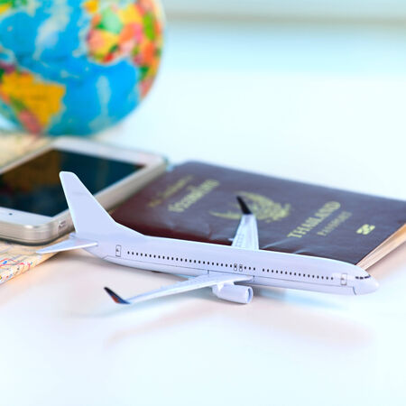 Travel concept. Passports, phone and airplane