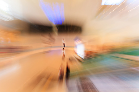 People in escalators at the modern shopping mall. motion blurの写真素材