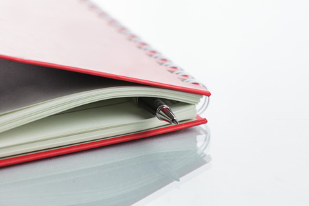 Red Notebook on white background