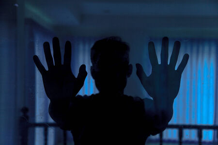 Shadow of men behind glassの写真素材