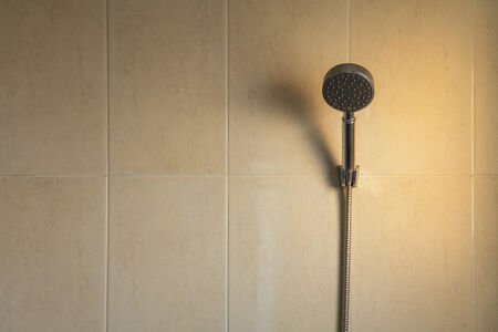 Shower on tile wallの写真素材
