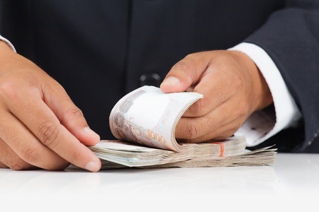 Businessman with huge amount of money
