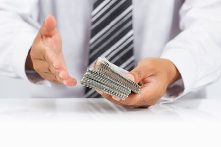 Businessman with huge amount of money