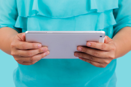 Woman using a tablet computerの写真素材