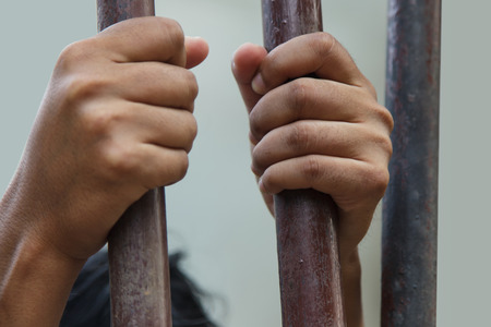 Hand in jailの写真素材