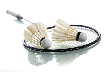Shuttlecock on badminton racketの写真素材