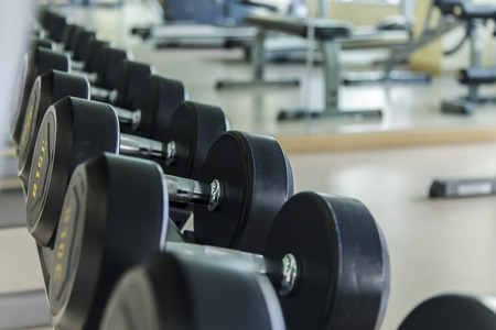 Empty fitness center with different training equipmentの写真素材