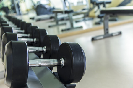 Empty fitness center with different training equipmentの写真素材