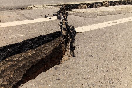 Cracked of asphalt roadの写真素材