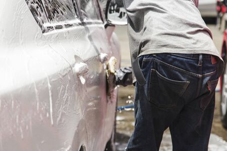 Washing a car at car wash service