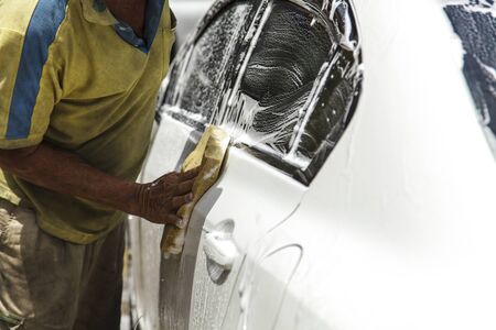 Washing a car at car wash service