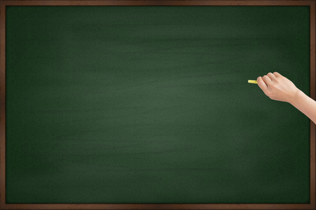 Hand writing with chalkの写真素材