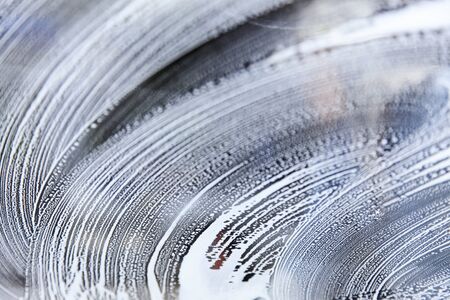 Car wash from inside the windscreen soapyの写真素材