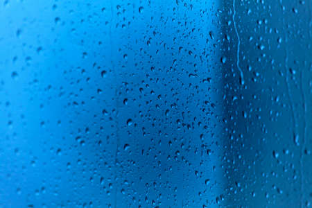 Raindrops on glass backgroundの写真素材