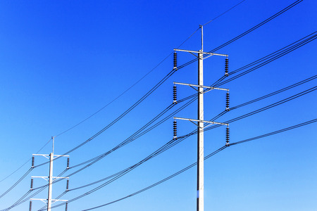 Electric pole on blue sky