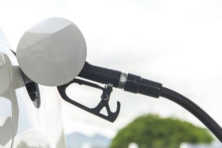 Gas pump for refueling car on gas stationの写真素材