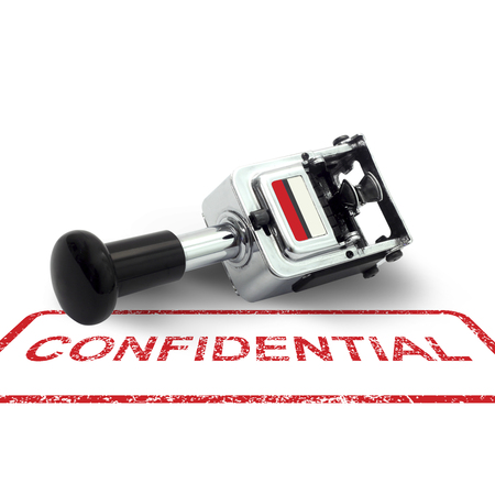 Rubber Stamp CONFIDENTIAL concept on a white backgroundの写真素材