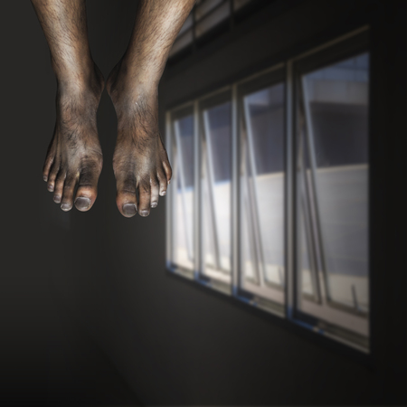 Legs were hanging on the dark background, Halloween conceptの写真素材