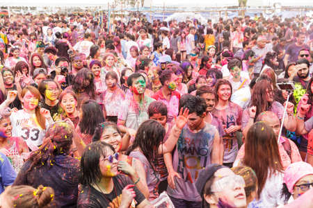 BANGKOK, THAILAND - March 2016: Unidentified People celebrating during the color throw at the Holi...