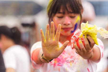 BANGKOK, THAILAND - March 2016: Unidentified People celebrating during the color throw at the Holi Festival of Colors on March 27, 2016 in Bangkok, Thailand.のeditorial素材