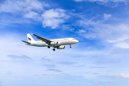 PHUKET, THAILAND - December 2015 : Bangkok airway airplane Landing at Phuket International airport in sunny day on December 25, 2015 in Phuket, Thailand.のeditorial素材