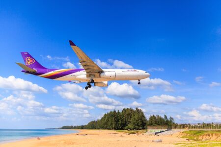 PHUKET, THAILAND - December 2015 : Thai airways airplane Landing at Phuket International airport in...